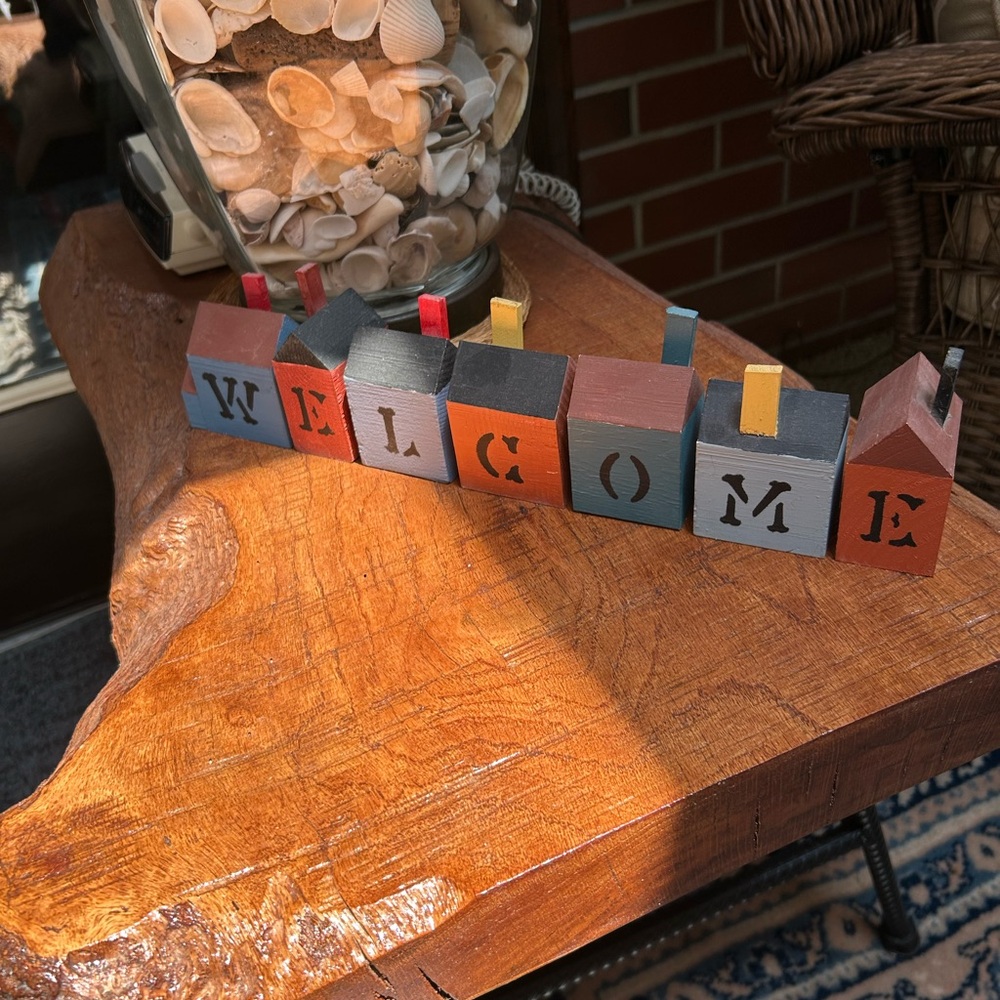 Colorful Wooden “Welcome” Sign- comprised of 7 individual homes